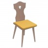 Sitzkissen Fanni in gelb uni mit Füllung auf einem Stuhl