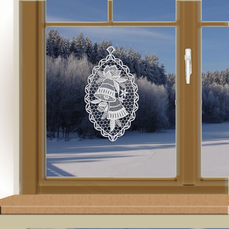 Klassisches Fensterbild Glocke am winterlichen Fenster Klassisches Fensterbild Glocke am winterlichen Fenster